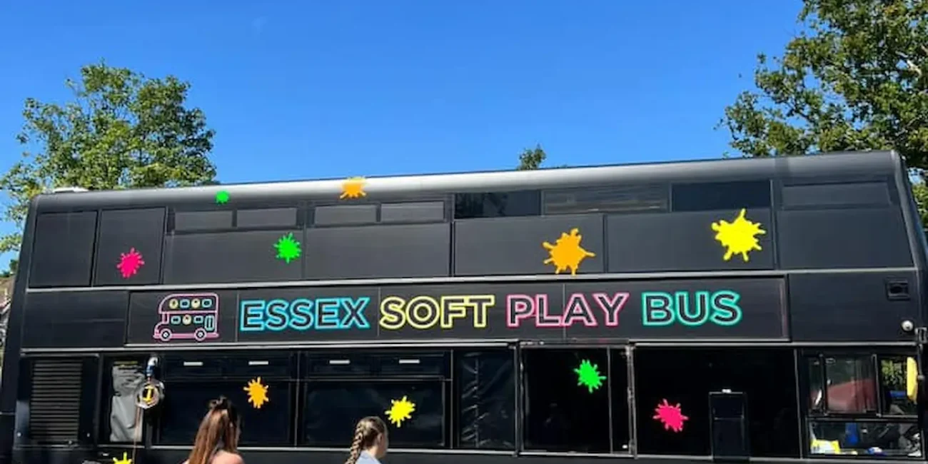 Children playing inside the Essex Soft Play Bus double decker soft play party bus at a birthday party in Essex